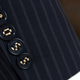 Illustration for article titled Extra Hole Buttons Let You Spell Out Messages On Your Clothing